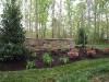 Plantings to soften up hardscape area.