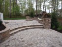Paver Patio with stone veneer sitting walls