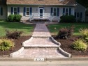 Paver pathway leading to road