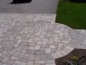 Circle inlaid in paver driveway pattern